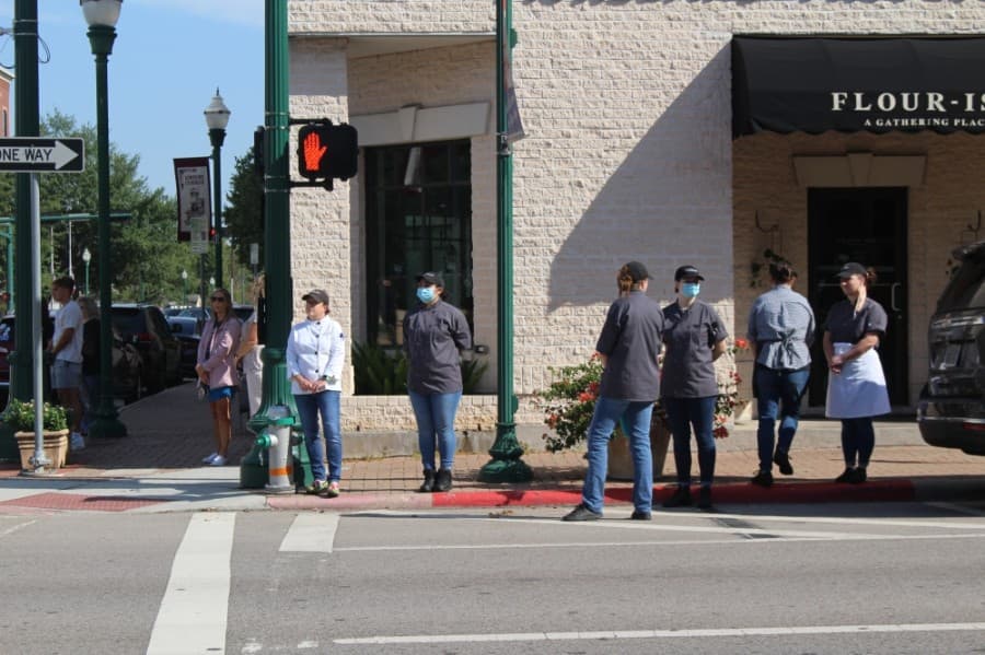 Dozens gathered in downtown Conroe. (Eva Vigh/Community Impact Newspaper)