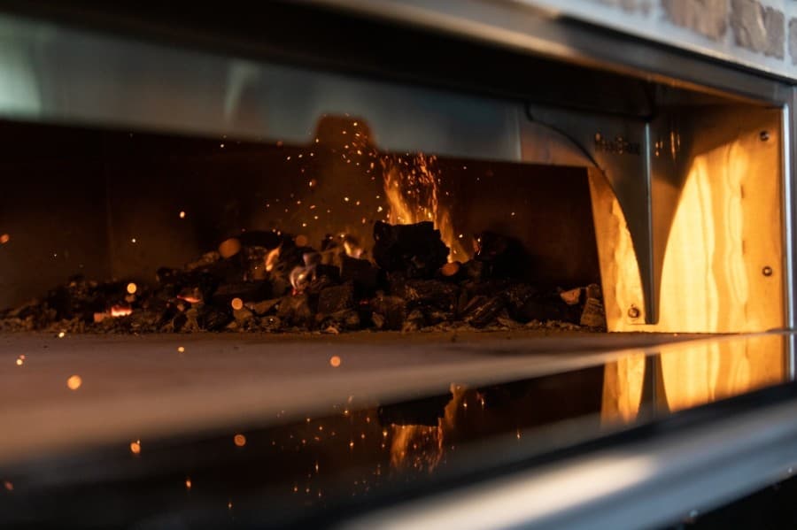 Tony C's menu features a combination of specialty pizzas and made-to-order combinations, all utilizing the restaurant's signature coal-fire cooking format. (Courtesy Tony C's Pizza & Beer Garden)
