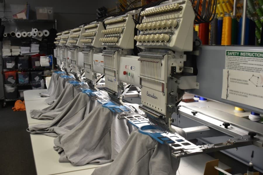 All embroidery at Logotology is done in-house. (Makenzie Plusnick/Community Impact Newspaper)