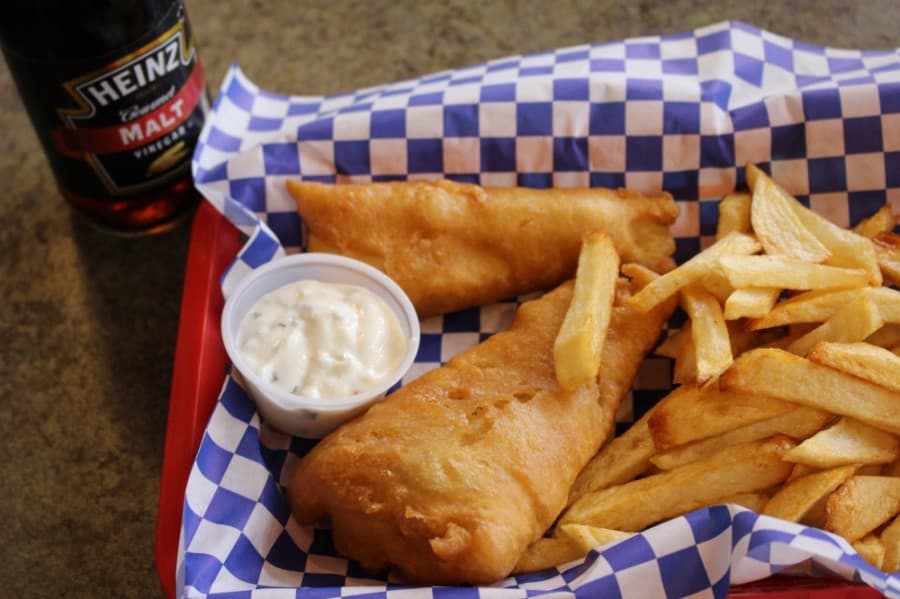 The English Style Fish and Chips ($12.99) •features fried, hand-battered cod fish served with hand-cut fries and Heinz malt vinegar. (Adriana Rezal/Community Impact Newspaper)