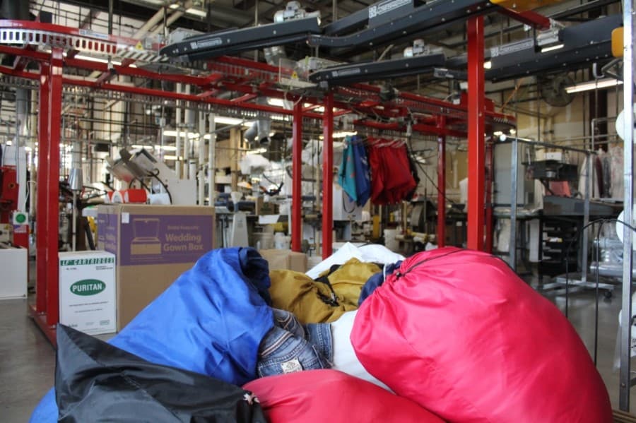 The production facility allows for deep cleaning to sanitize a variety of clothing. (Photos by Ian Pribanic/Community Impact Newspaper)