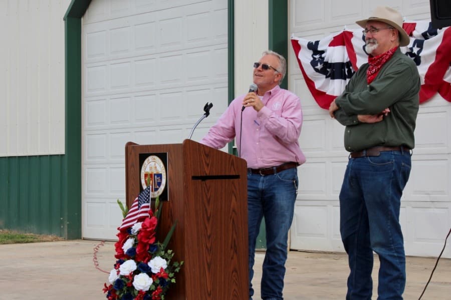 City Manager Rob Hauck (left) and Precinct 4 Commissioner Jack Cagle address staff and community members during a Sept. 25 ribbon-cutting for Broussard Park in Tomball. (Anna Lotz/Community Impact Newspaper)
