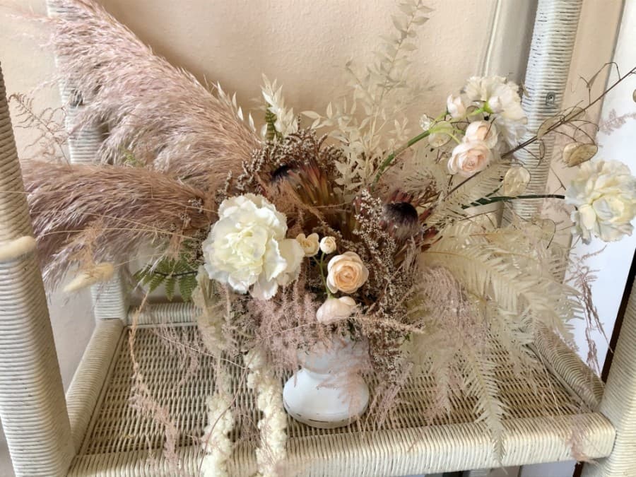 Mixing fresh flowers with dried and bleached blooms is popular right now, according to Bennett and Dunn. The assemblages have been all the rage for about a year and a half. When it comes to “everlasting arrangements,” dried flowers are an old favorite, but bleaching plants is a different want to preserve them. (Sally Grace Holtgrieve/Community Impact Newspaper)