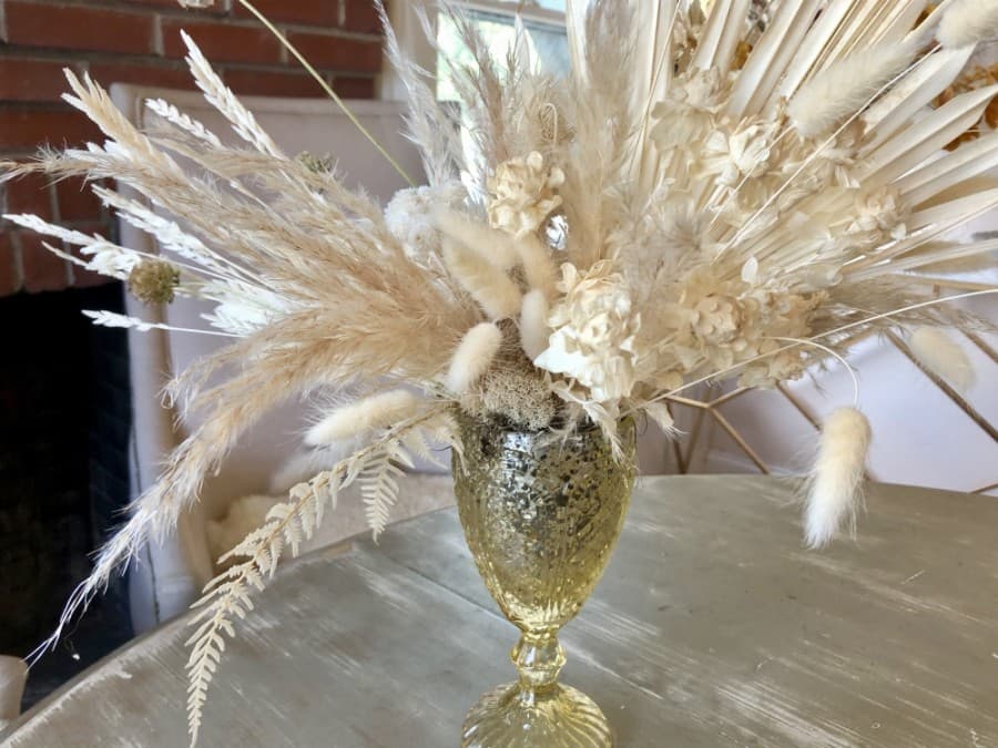 Mixing fresh flowers with dried and bleached blooms is popular right now, according to Bennett and Dunn. The assemblages have been all the rage for about a year and a half. When it comes to “everlasting arrangements,” dried flowers are an old favorite, but bleaching plants is a different want to preserve them. (Sally Grace Holtgrieve/Community Impact Newspaper)