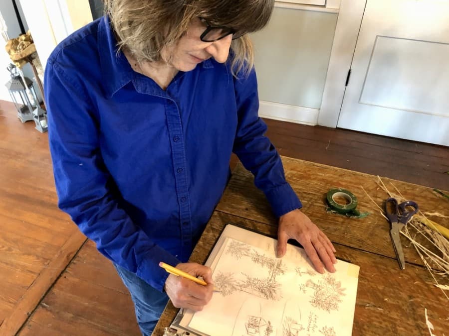 Donna Bennett begins all floral wedding designs with sketches. (Sally Grace Holtgrieve/Community Impact Newspaper)