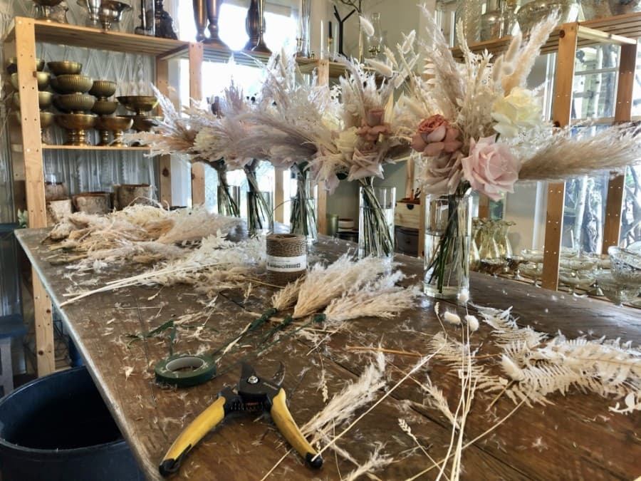 Mixing fresh flowers with dried and bleached blooms is popular right now, according to Bennett and Dunn. The assemblages have been all the rage for about a year and a half. When it comes to “everlasting arrangements,” dried flowers are an old favorite, but bleaching plants is a different want to preserve them. (Sally Grace Holtgrieve/Community Impact Newspaper)