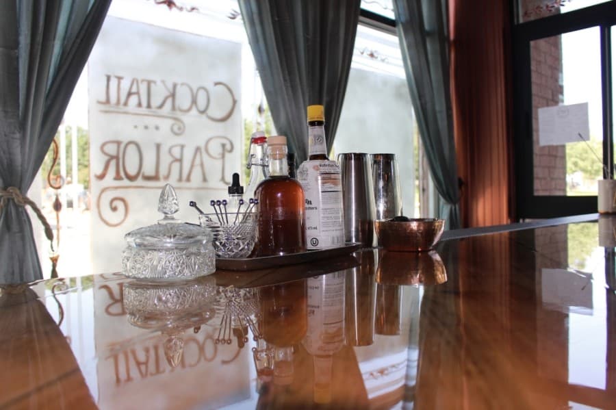 Small details are scattered across the bar to evoke a cocktail parlor mixed with a 1920s supper area. (Miranda Jaimes/Community Impact Newspaper)