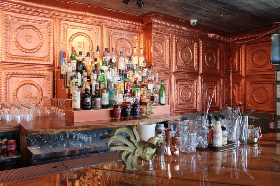 Small details are scattered across the bar to evoke a cocktail parlor mixed with a 1920s supper area. (Miranda Jaimes/Community Impact Newspaper)