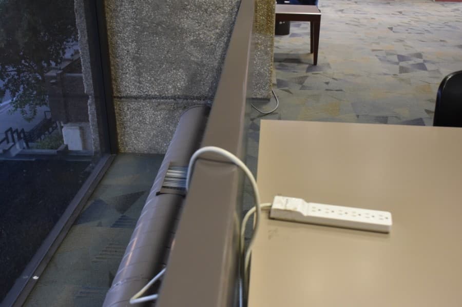 A lack of outlets in the library make it hard for people to use laptops around the building, library staff said. (Makenzie Plusnick/Community Impact Newspaper)