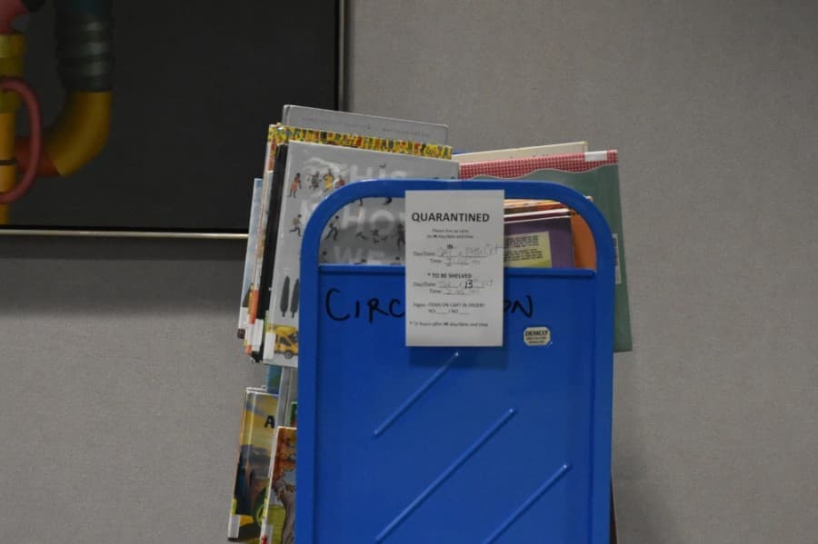 The reference department is currently being used to quarantine books after they have been checked out. (Makenzie Plusnick/Community Impact Newspaper)