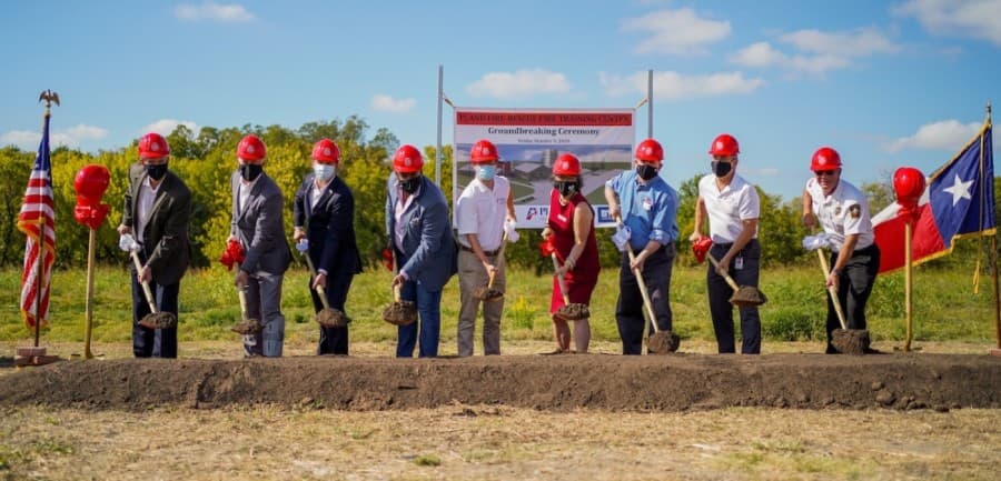 Staff in the city of Plano, including (from left) Deputy City Manager Jack Carr, City Manager Mark Israelson, City Council Member Shelby Williams, Mayor Harry LaRosiliere, Deputy Mayor Pro Tem Anthony Ricciardelli, City Council Member Maria Tu, City Council Member Rick Grady, Deputy City Manager Greg Rushin and Fire Chief Sam Greif, ceremoniously broke ground on the training center Oct. 9. (Courtesy Plano Fire-Rescue)