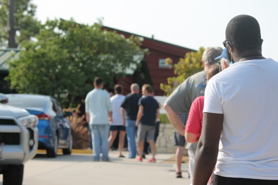 Voters wait in line at Big Stone Lodge on Oct. 13. (Andy Li/Community Impact Newspaper)