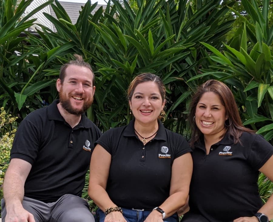 Daniela Herrero works with several team members at Precise Translations. (Courtesy Precise Translations)