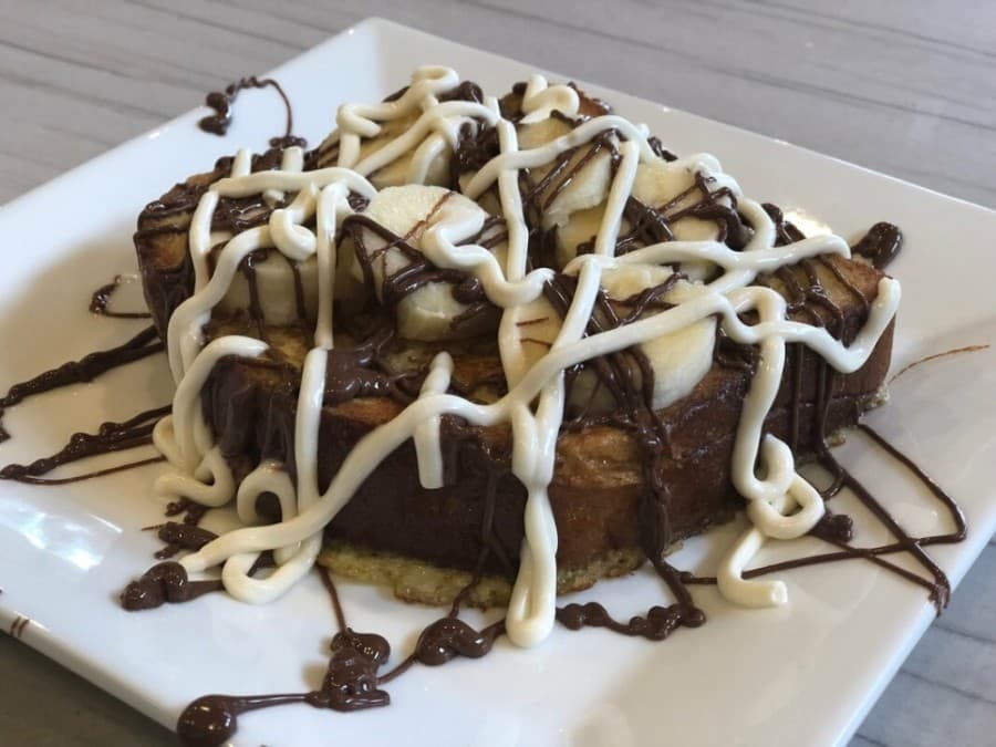 The Banana Nutella French Toast ($9.95) is popular with those looking for a sweet breakfast dish. (Courtesy Biscuit)