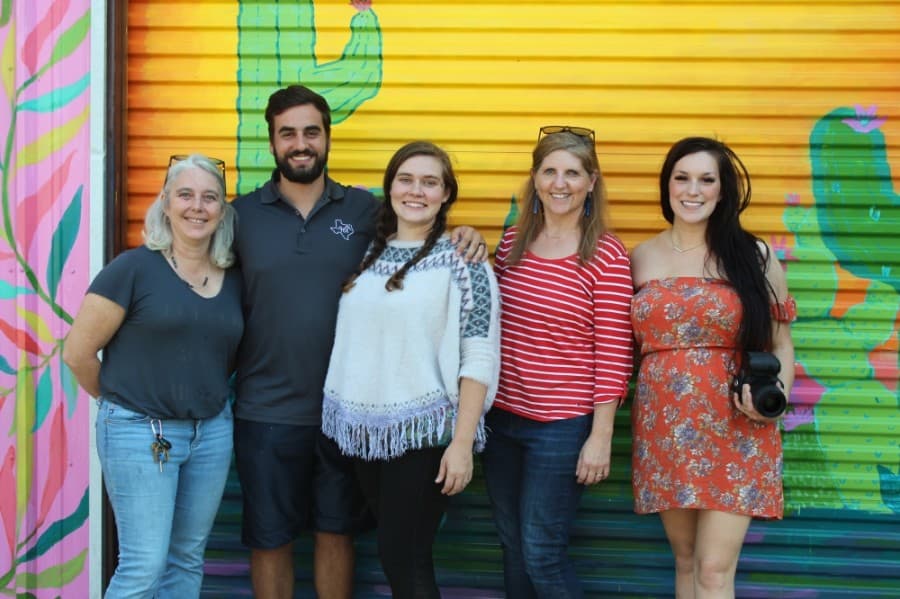 From left: Jeanie James, Cody and Jessie Stevens, Shona Cole and Madeleine Frost co-founded The Grounds nonprofit earlier this year and are working to revitalize the property. (Photos by Anna Lotz/Community Impact Newspaper)