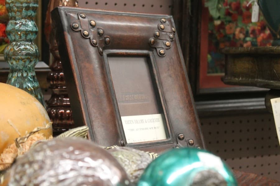 Owner Randall Tate and his family make all frames in-house. (Colleen Ferguson/Community Impact Newspaper)
