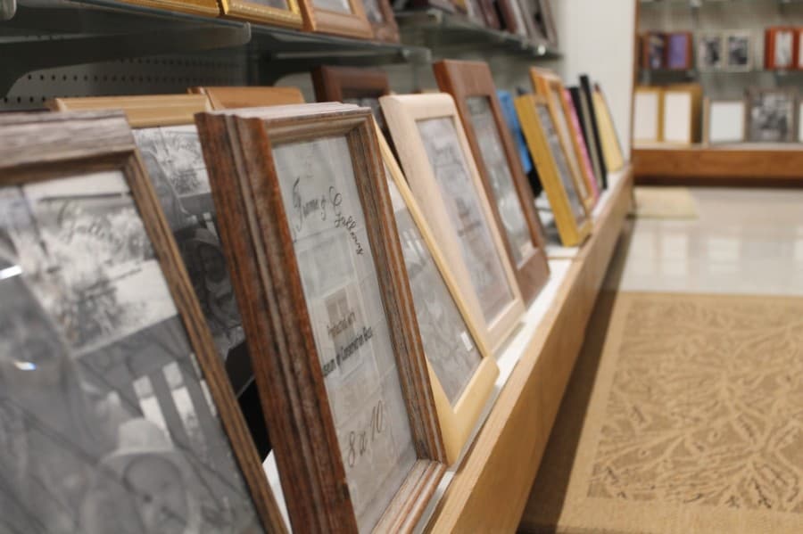 Owner Randall Tate and his family make all frames in-house. (Colleen Ferguson/Community Impact Newspaper)