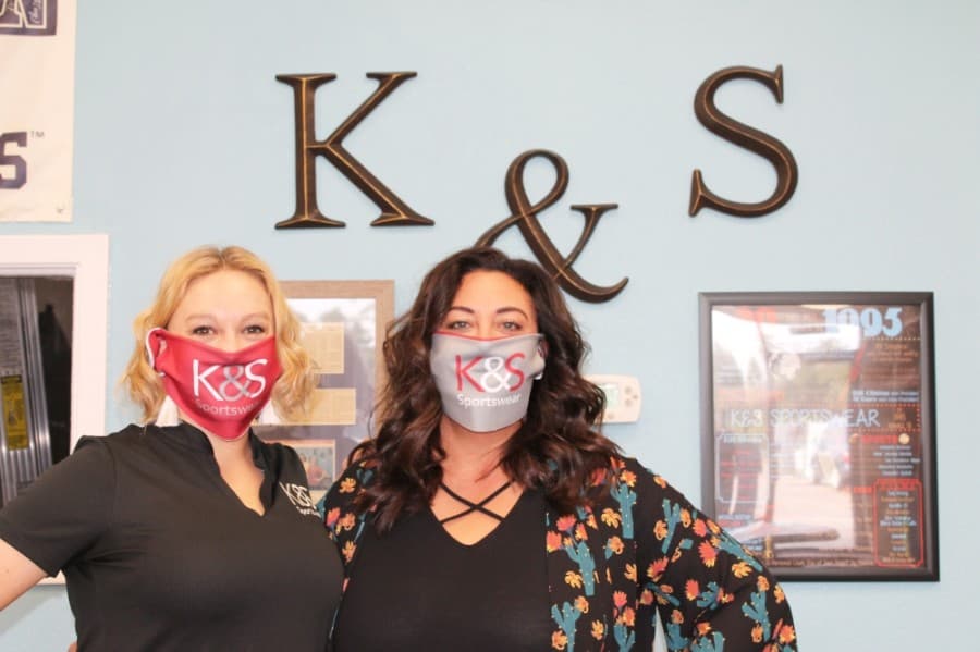 Owner Brittney Mittag and Account Manager Sarah Otis run K&S Sportswear. (Andy Li/Community Impact Newspaper) 