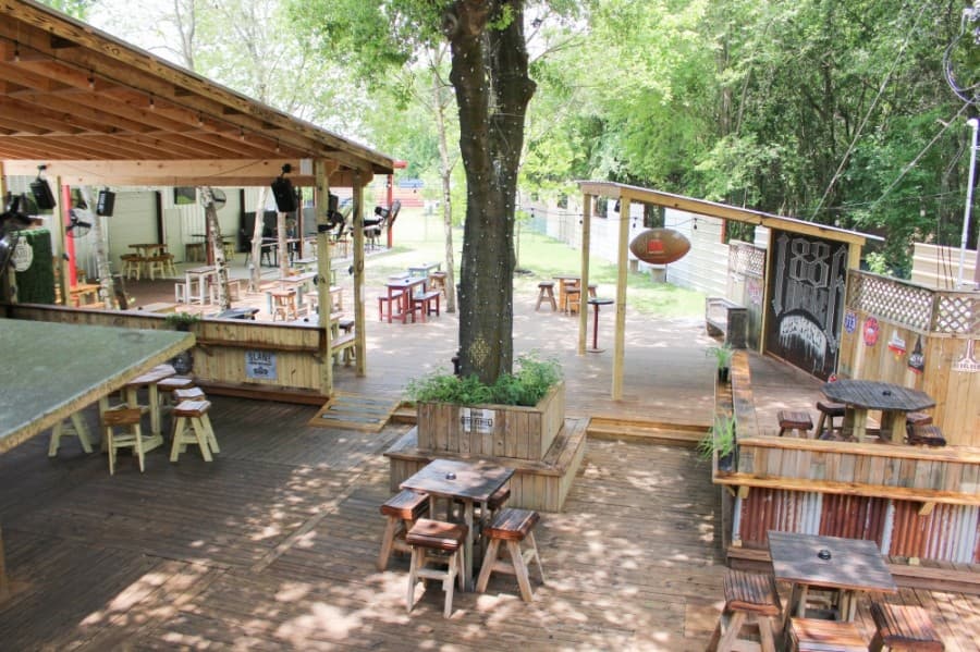 1886 Humble Backyard has a large outdoor patio for live music and games. (Kelly Schafler/Community Impact Newspaper)