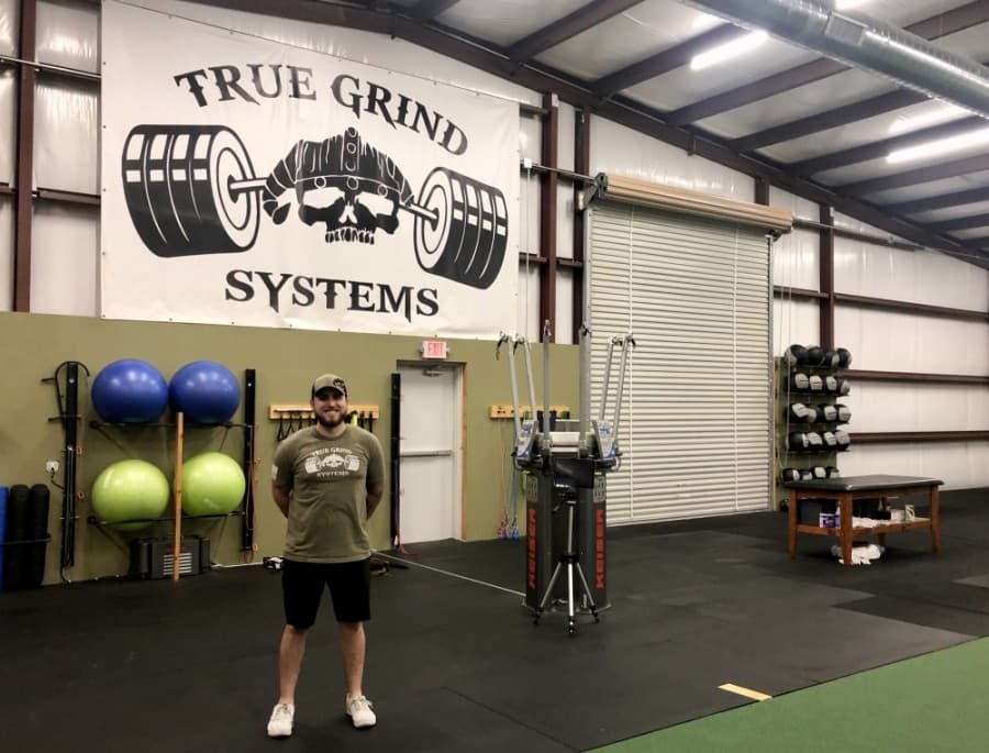 Brandon Janecka operates True Grind Systems, which partners with 180 Performance Center to maximize the physical health of players. (Sally Grace Holtgrieve/Community Impact Newspaper)