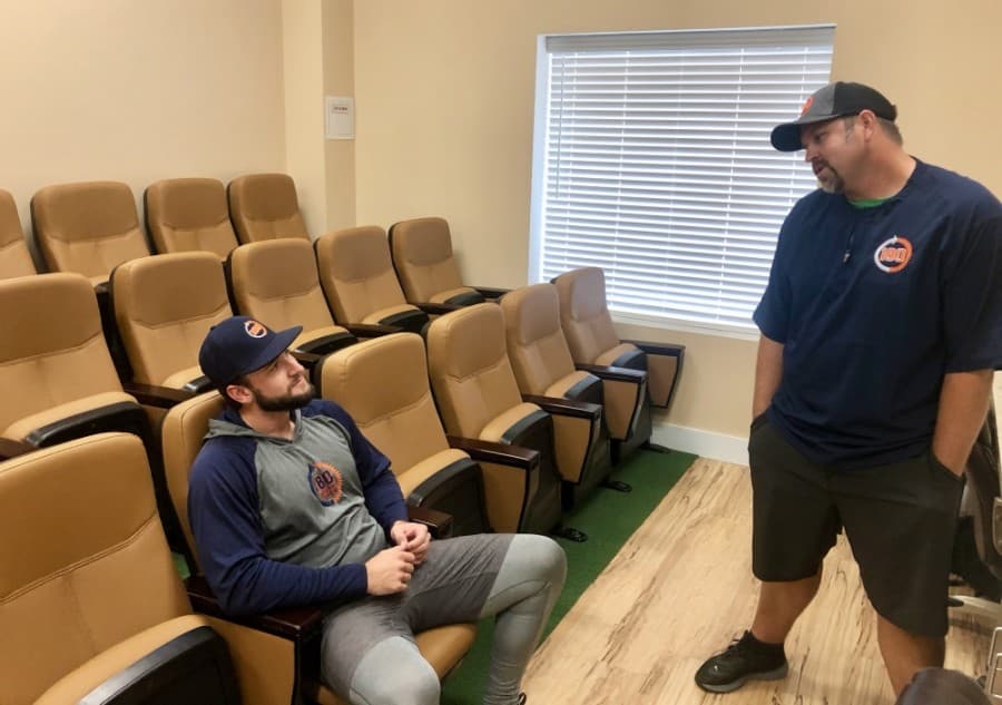 Minnesota Twins catcher Kyle Schmidt talks to Heath Bell, an 11-year major league baseball player. (Sally Grace Holtgrieve/Community Impact Newspaper)