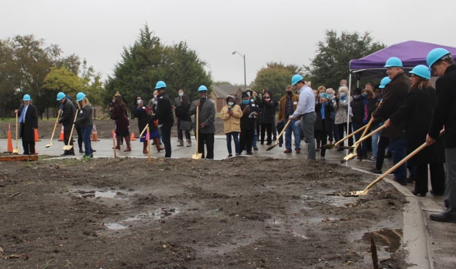 Habitat for Humanity of Collin County and McKinney officials break ground on the site that will house the Cotton Groves project. (Miranda Jaimes/Community Impact Newspaper)