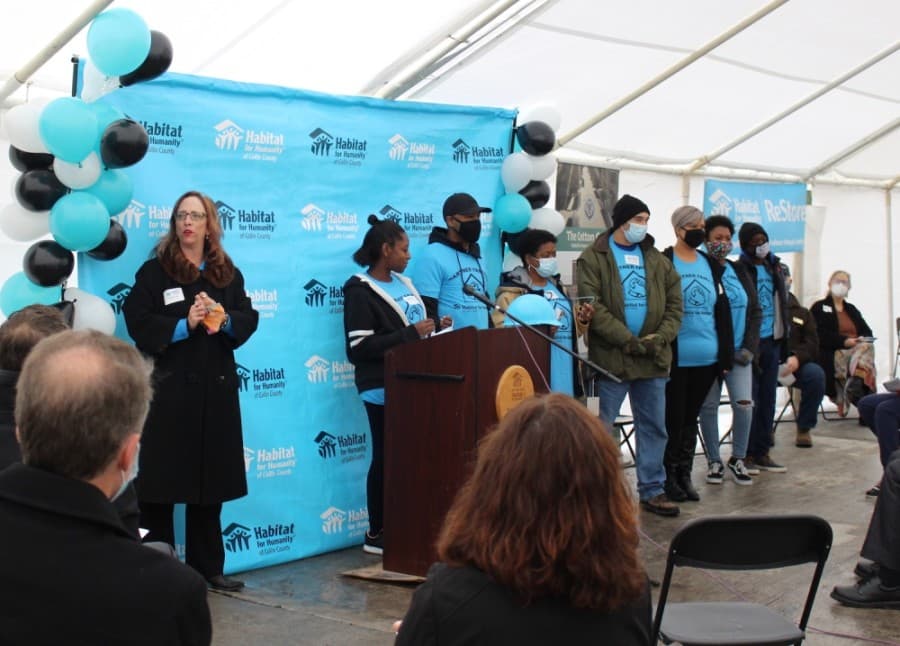 Habitat for Humanity of Collin County CEO and President Celeste Cox, left, introduced the first four homeowners in Cotton Groves. (Miranda Jaimes/Community Impact Newspaper)