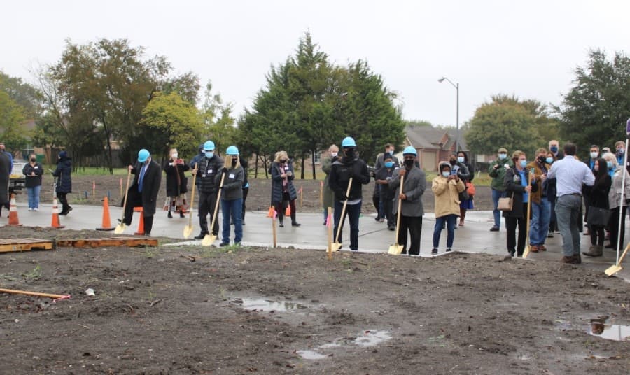 Habitat for Humanity of Collin County and McKinney officials break ground on the site that will house the Cotton Groves project. (Miranda Jaimes/Community Impact Newspaper)