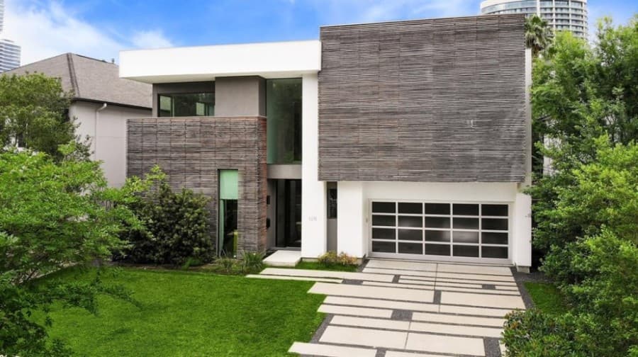 3215 Sackett St., Houston: A modern home design by the architecture studio George Allen Cole uses glass and cumaru wood for a contemporary feel. 4 bed, 2 full and 2 half bath/4,812 sq. ft. Sold for $1,888,001-$2,176,000 on Oct. 19. (Courtesy Houston Association of Realtors)