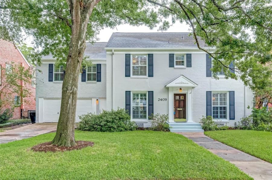 2409 Dryden Road, Houston: A 1940 traditional house within walking distance to Rice Village, this historic home has been updated while still keeping its roots. The entry opens to a formal dining and living room with hardwood floors. An updated kitchen features silestone countertops, an island, stainless steel appliances, a built-in desk, a pantry, a coffee bar and a breakfast nook. The primary bedroom has space for a sitting room and includes large walk-in closets, plus three additional updated baths with a walk-in shower and double sinks. It additionally features guest bedrooms upstairs. 5 bed, 3 full, 1 half bath / 4,096 sq. ft. Sold for $947,001-$1,082,000 on Oct. 21. (Courtesy Houston Association of Realtors)