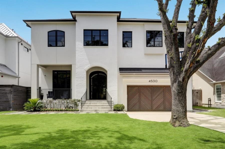 4530 Elm St., Bellaire: This 2016 custom contemporary home comes with high-end finishes, including an exterior accented with steel and glass doors and a front porch, a large study that overlooks the front, an open-concept family room and a kitchen that overlooks a backyard with a Coyote grill, a fireplace, a heated pool and a turfed backyard. It also features a family room with wood beams and a folding glass wall as well as a chef’s kitchen. 5 bed, 5 full, 1 half bath / 5,445 sq. ft. Sold for $1,888,001-$2,176,000 on Oct. 1. (Courtesy Houston Association of Realtors)
