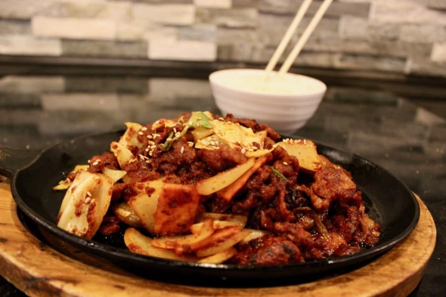 Beef bulgogi is a Korean dish composed of stir-fried beef and vegetables served with white rice. (Taylor Jackson Buchanan/Community Impact Newspaper)