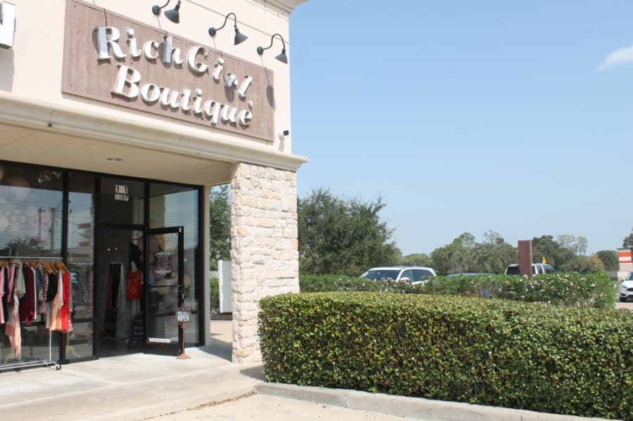 The store is located at 1807 Broadway St., Ste. 101, Pearland.