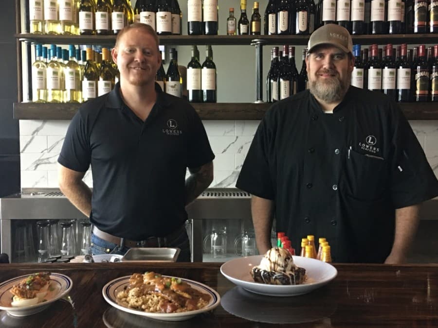 Cody Miller (left) and Chef Todd Fuqua own Lowens Seafood in Friendswood. (Haley Morrison/Community Impact Newspaper)