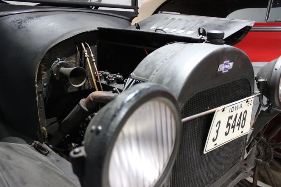 This Chevrolet pickup truck dates is one of the earliest models of its kind. It dates back to the 1910s, Dave and Maris Garrett said. Dave and Maris Garrett moved their classic car business to Lewisville three years ago. (Daniel Houston/Community Impact Newspaper)