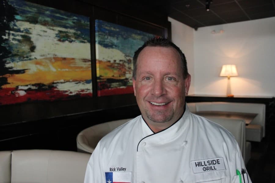 Rick Valley is the general manager and part-owner of Hillside Fine Grill. (Daniel Houston/Community Impact Newspaper)