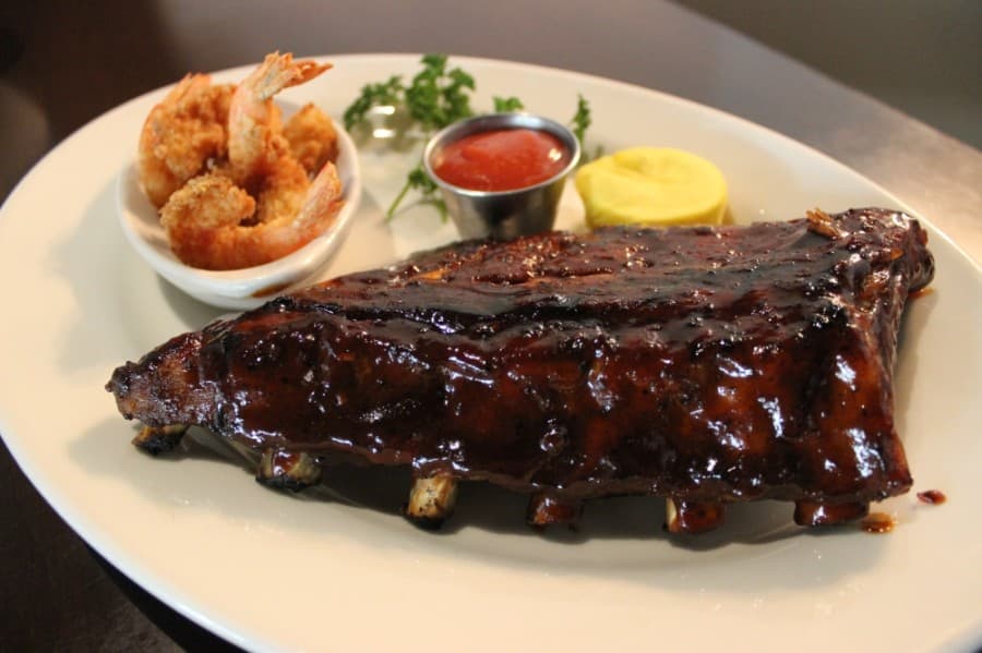 Ribs and shrimp ($17.50)
A slab of ribs served with fried shrimp, this dish comes with with fries and cole slaw on the side.
(Daniel Houston/Community Impact Newspaper)