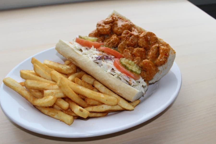 The Voodoo Po-Boy ($13.99) features breaded shrimp tossed in a spicy sauce. (Eva Vigh/Community Impact Newspaper)