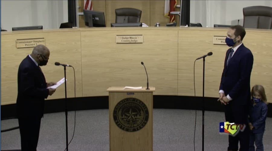Andy Brown sworn in as Travis County Judge, accepting baton from interim Judge Sam Biscoe