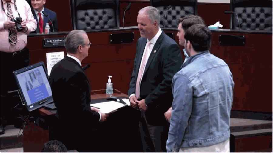 Curt Maddux, right, was sworn into Place 2 on Nov. 17. (Screenshot courtesy city of Conroe)