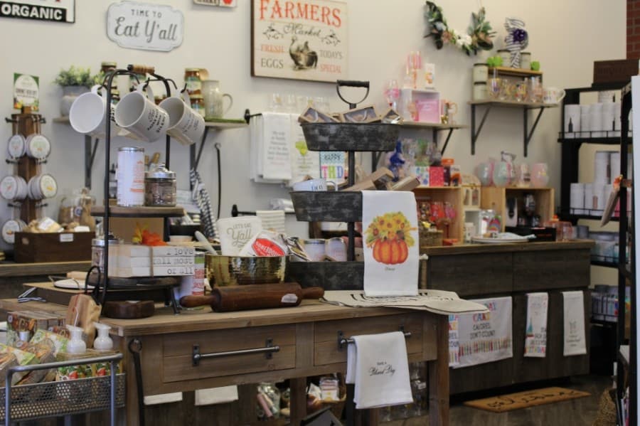 The boutique offers a selection of items, ranging from home decor to apparel and food. (Adriana Rezal/Community Impact Newspaper)