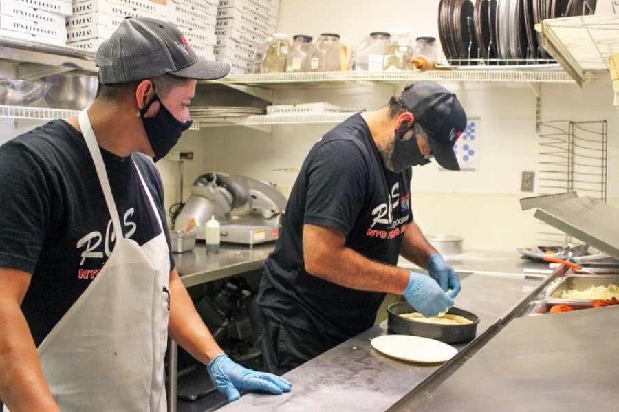 RC’s NYC Pizza & Pasta makes each pizza by hand. (Andy Li/Community Impact Newspaper)