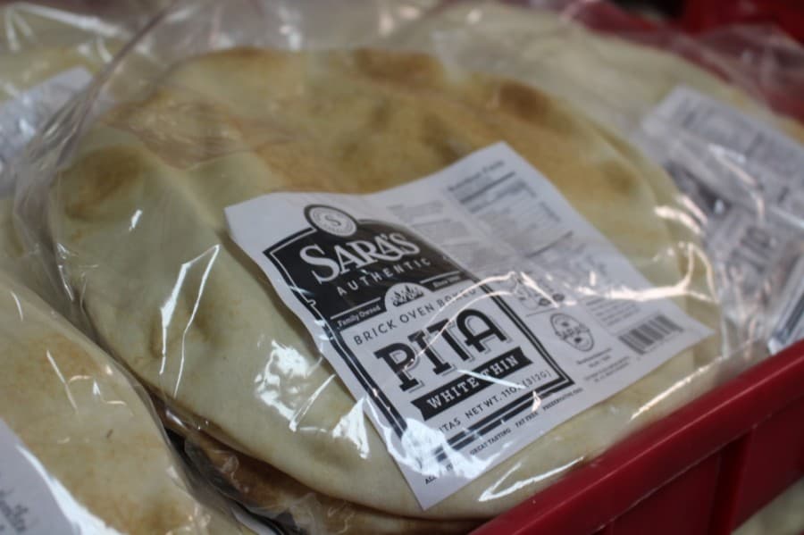 The business is known for its name-brand, paper-thin pita bread, which is manufactured in Richardson and made with non-GMO, unbleached flour and unrefined sea salt. (Olivia Lueckemeyer/Community Impact Newspaper)