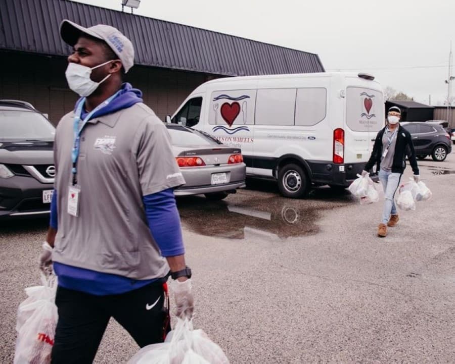 Volunteers wear masks and gloves and provide no-contact delivery of all meal deliveries to prevent further spread of the coronavirus. (Courtesy Meals on Wheels Collin County)