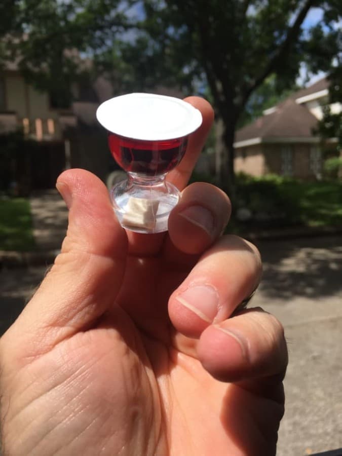 Attendees of The Family of Faith Lutheran Church take part in Communion with prepackaged elements. (Courtesy The Family of Faith Lutheran Church)