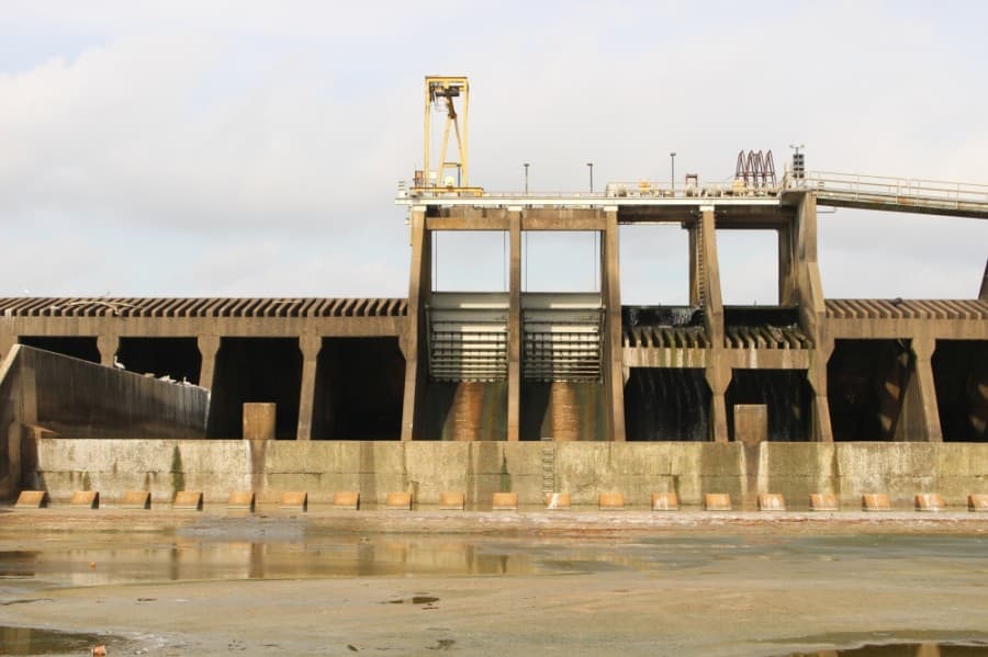 The Lake Houston dam consists of four small gates and a spillway structure. Officials hope to add new gates to the dam to increase release capacity during rain events. (Kelly Schafler/Community Impact Newspaper)