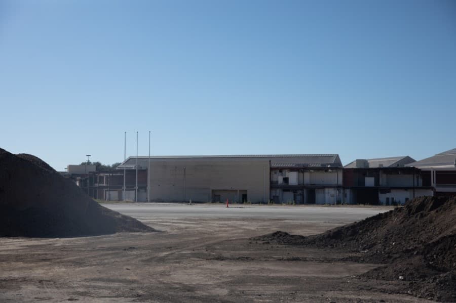 Demolition of the original Collin Creek Mall is ongoing since the project's start in 2019. The first phase of the project is expected to open in 2022 with new apartment buildings, restaurants and underground parking facilities. (Liesbeth Powers/Community Impact Newspaper)