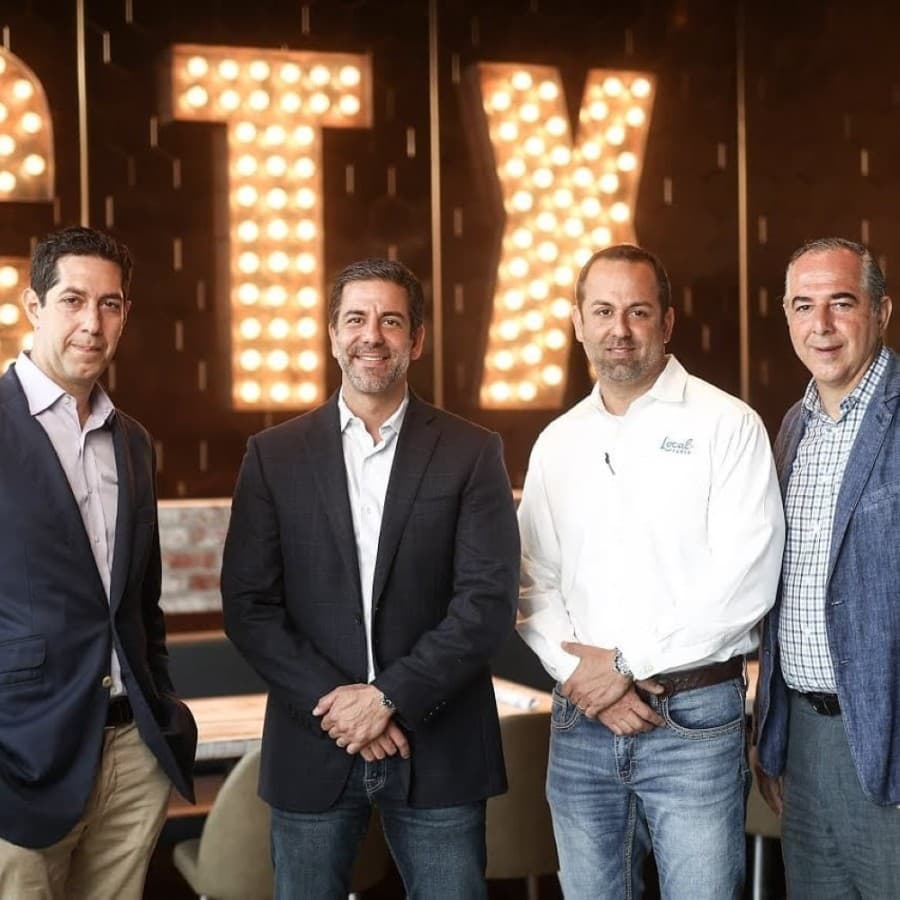 Left to right: Alborz Nowamooz, Shervin Sharifi, Neima Sharifi and Ashkan Nowamooz own Local Table. (Courtesy Local Table)