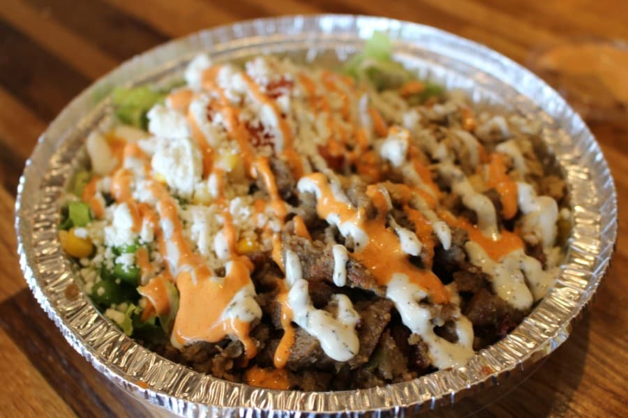 


A rice bowl with chicken and gyro meat ($9.99)