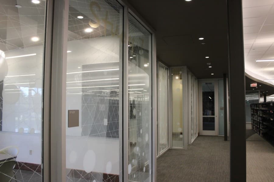 A series of new study rooms line the back wall of the Flower Mound library building. (Daniel Houston/Community Impact Newspaper)